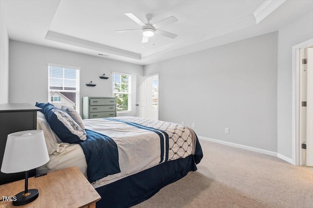 320 Everly Mist Way, Wake Forest, NC 27587 - carpeted bedroom with a tray ceiling, baseboards, ceiling fan, and crown molding