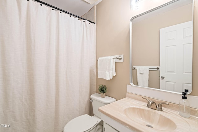 full bathroom with toilet, vanity, and a shower with shower curtain