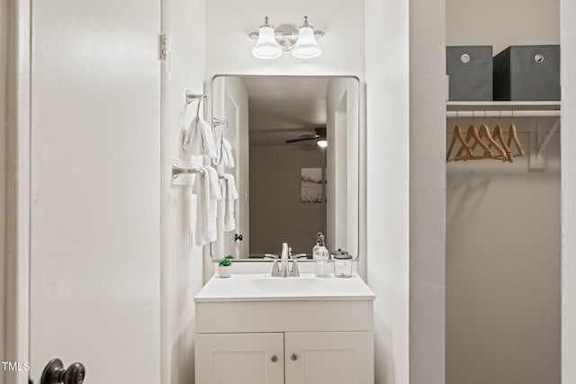 bathroom featuring vanity and ceiling fan