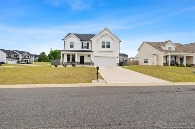 1307 Water Leaf Dr, Fayetteville, NC 28314 - modern farmhouse style home featuring stone siding, a garage, a front lawn, and driveway