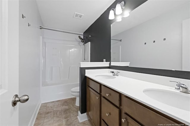 1307 Water Leaf Dr, Fayetteville, NC 28314 - bathroom with toilet, double vanity, shower / washtub combination, baseboards, and marble finish flooring