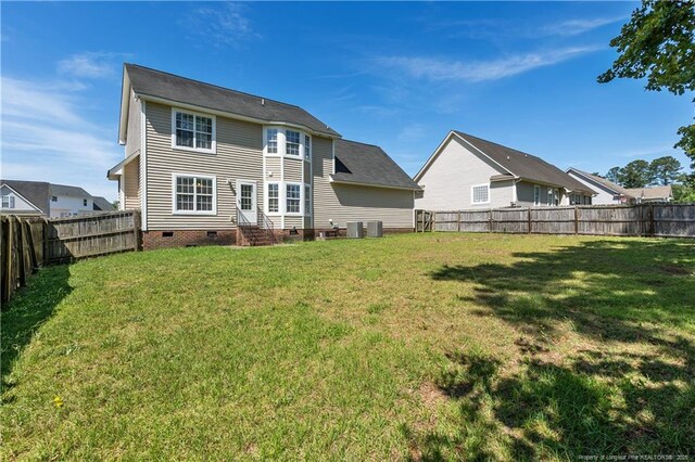 9012 Grouse Run Ln, Fayetteville, NC 28314 - back of property with crawl space, entry steps, and central AC unit