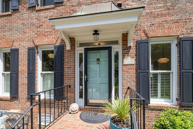 8420 Caldbeck Dr, Raleigh, NC 27615 - doorway to property featuring brick siding