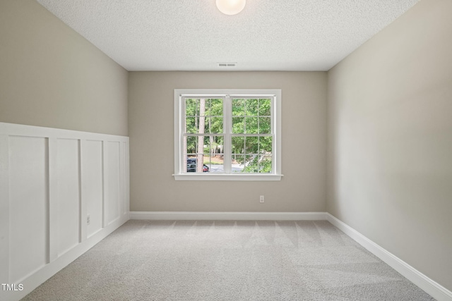 1005 Barmkin Pl, Knightdale, NC 27545 - unfurnished room with carpet and a textured ceiling