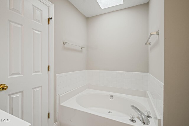 1005 Barmkin Pl, Knightdale, NC 27545 - full bath with a garden tub and a skylight