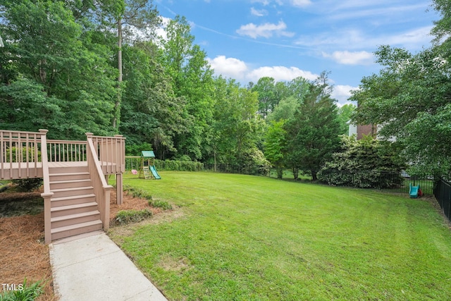1005 Barmkin Pl, Knightdale, NC 27545 - view of yard with a playground and a deck