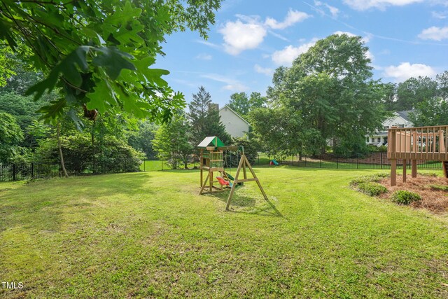 1005 Barmkin Pl, Knightdale, NC 27545 - view of yard with a playground and a deck