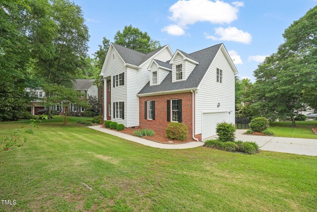 1005 Barmkin Pl, Knightdale, NC 27545 - view of side of home featuring brick siding, a garage, driveway, a yard, and a shingled roof