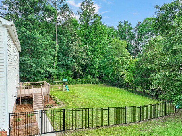 1005 Barmkin Pl, Knightdale, NC 27545 - view of yard with a playground and a wooden deck