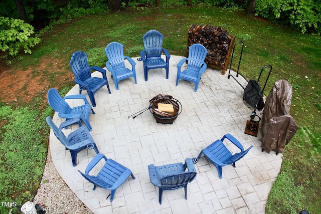 3750 Mebane Rogers Rd, Mebane, NC 27302 - view of patio with an outdoor fire pit