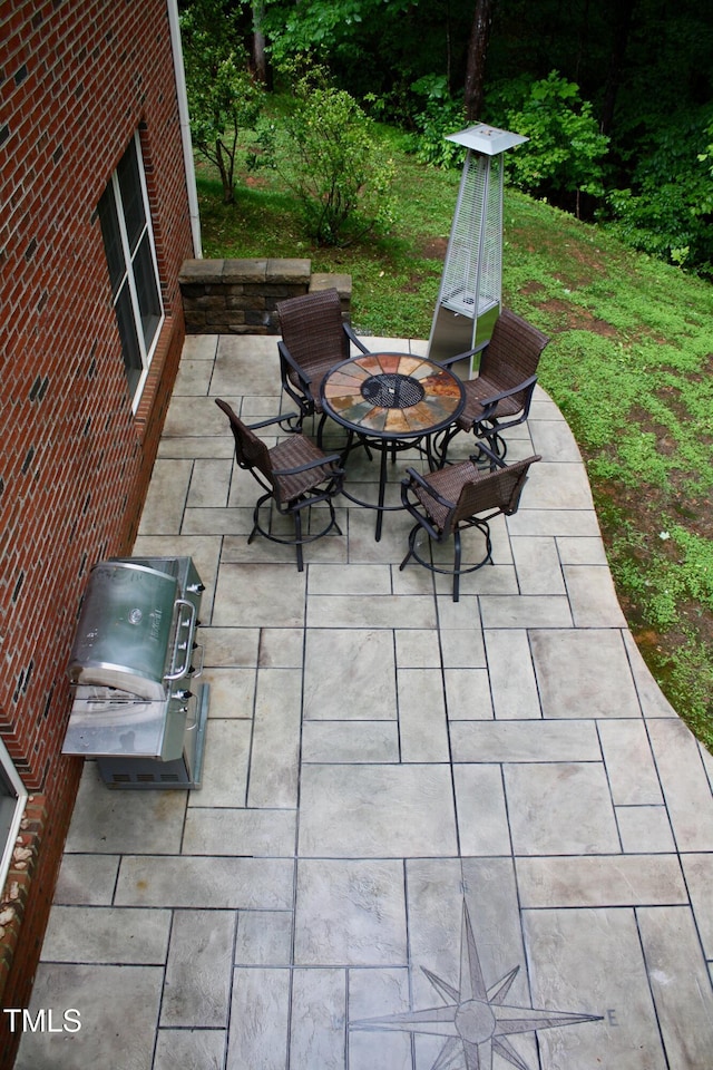 3750 Mebane Rogers Rd, Mebane, NC 27302 - view of patio with a fire pit