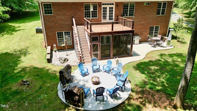 3750 Mebane Rogers Rd, Mebane, NC 27302 - rear view of property featuring a fire pit, french doors, stairway, a patio, and a yard