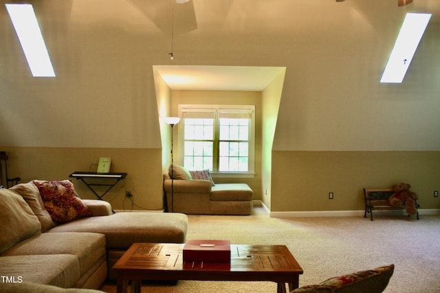 3750 Mebane Rogers Rd, Mebane, NC 27302 - carpeted living room featuring a skylight, a ceiling fan, and baseboards