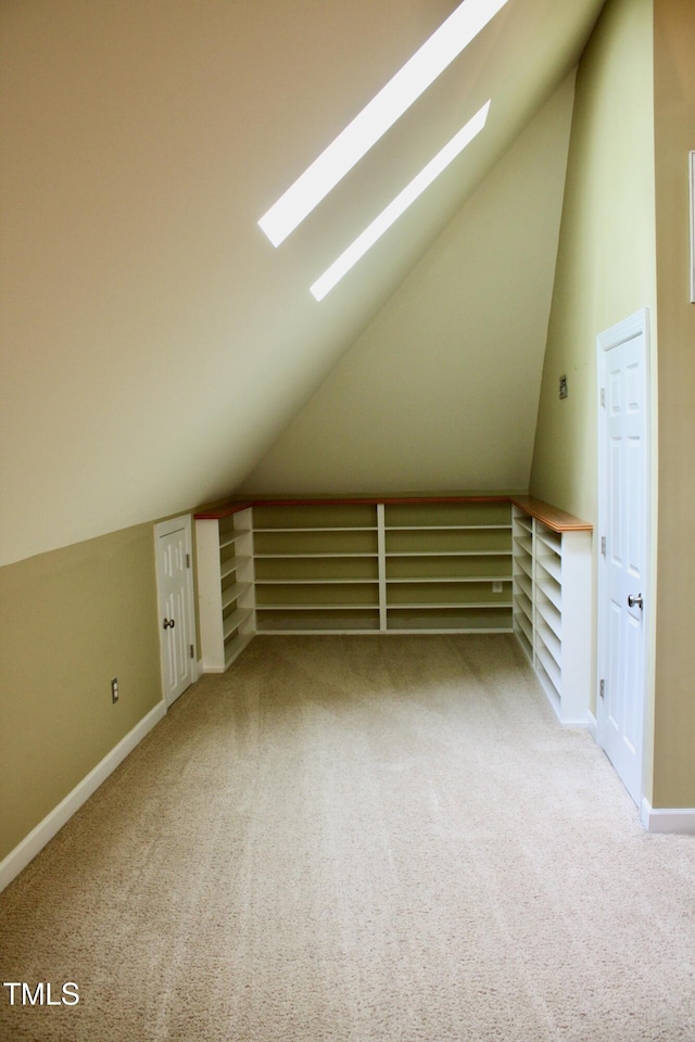 3750 Mebane Rogers Rd, Mebane, NC 27302 - bonus room featuring a skylight, lofted ceiling, carpet flooring, and baseboards