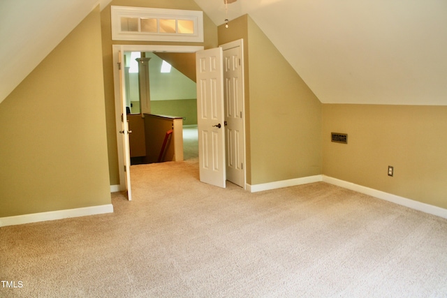 3750 Mebane Rogers Rd, Mebane, NC 27302 - additional living space with vaulted ceiling, carpet, and baseboards