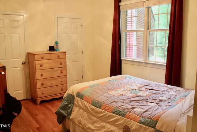 3750 Mebane Rogers Rd, Mebane, NC 27302 - bedroom with light wood finished floors and multiple windows