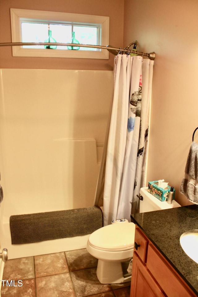 3750 Mebane Rogers Rd, Mebane, NC 27302 - bathroom featuring a shower with shower curtain, vanity, and toilet