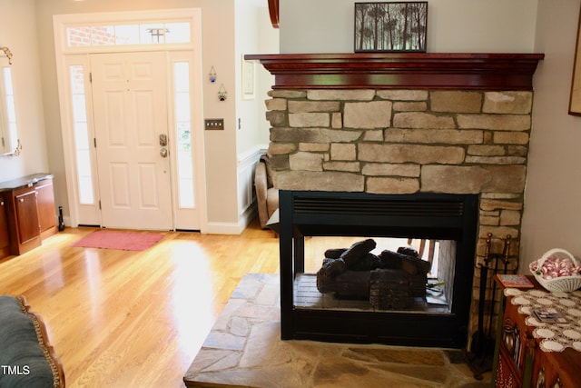 3750 Mebane Rogers Rd, Mebane, NC 27302 - entrance foyer with wood finished floors and a stone fireplace