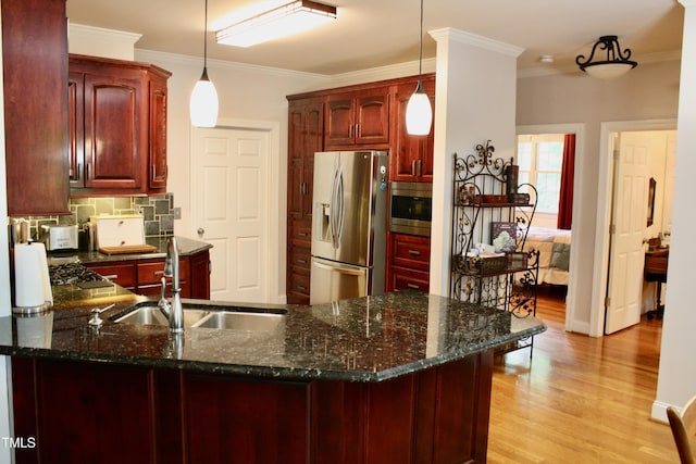 3750 Mebane Rogers Rd, Mebane, NC 27302 - kitchen featuring stainless steel appliances, reddish brown cabinets, a sink, crown molding, and light wood-style floors