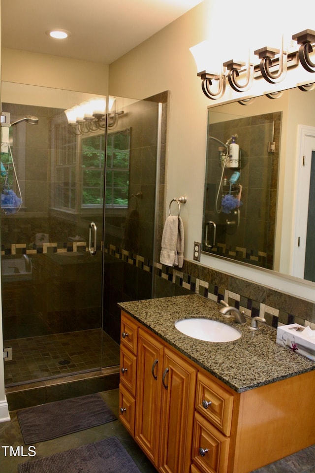 3750 Mebane Rogers Rd, Mebane, NC 27302 - full bathroom with a chandelier, vanity, a stall shower, and tile patterned flooring