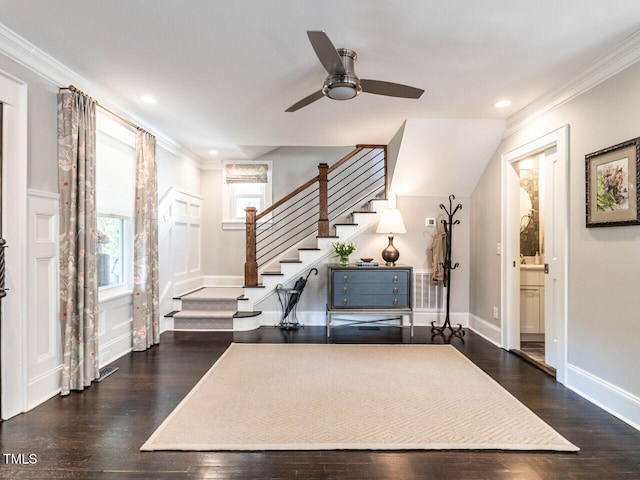 2303 Byrd St, Raleigh, NC 27608 - entrance foyer with stairway, ornamental molding, recessed lighting, wood finished floors, and a ceiling fan