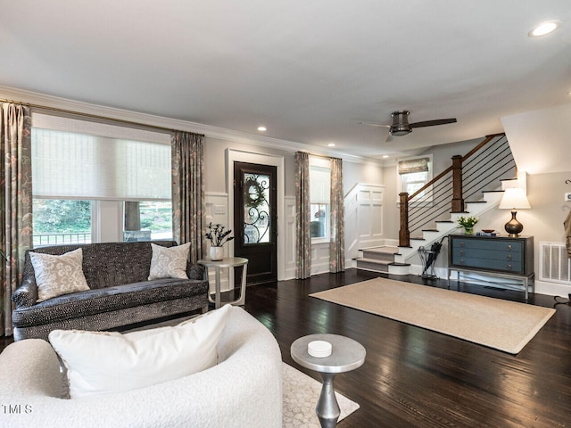 2303 Byrd St, Raleigh, NC 27608 - living room with stairway, ornamental molding, wood finished floors, a ceiling fan, and recessed lighting