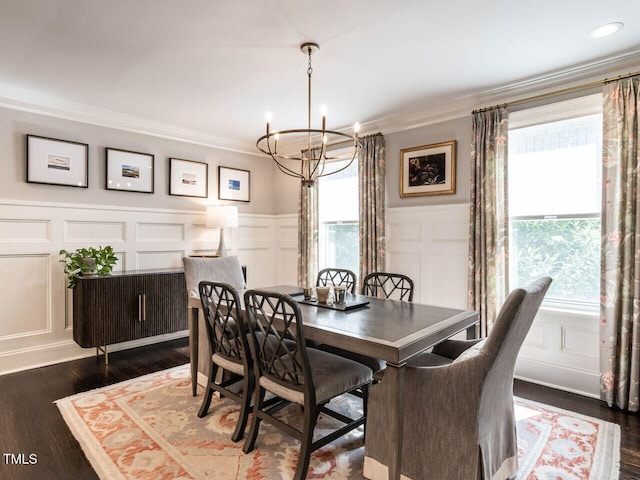 2303 Byrd St, Raleigh, NC 27608 - dining room with a decorative wall, crown molding, a chandelier, plenty of natural light, and dark wood-style floors