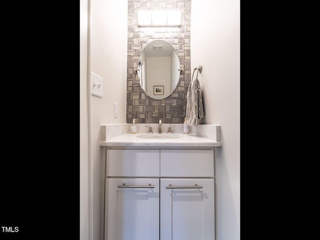 2303 Byrd St, Raleigh, NC 27608 - bathroom with vanity and backsplash