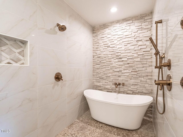 2303 Byrd St, Raleigh, NC 27608 - full bathroom with tile walls, tiled shower, and a soaking tub