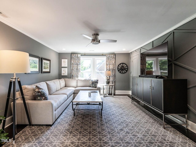 2303 Byrd St, Raleigh, NC 27608 - living area with crown molding, ceiling fan, baseboards, and recessed lighting
