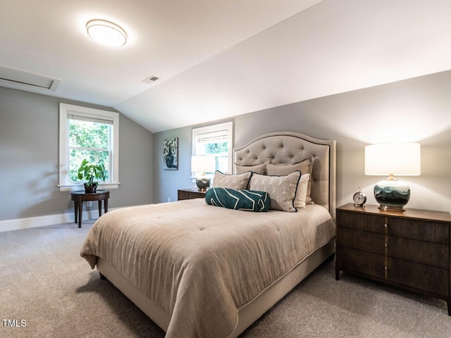 2303 Byrd St, Raleigh, NC 27608 - bedroom featuring light carpet, lofted ceiling, multiple windows, and baseboards
