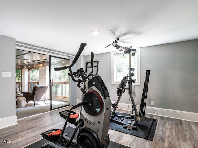 2303 Byrd St, Raleigh, NC 27608 - exercise area featuring healthy amount of natural light, wood finished floors, and baseboards