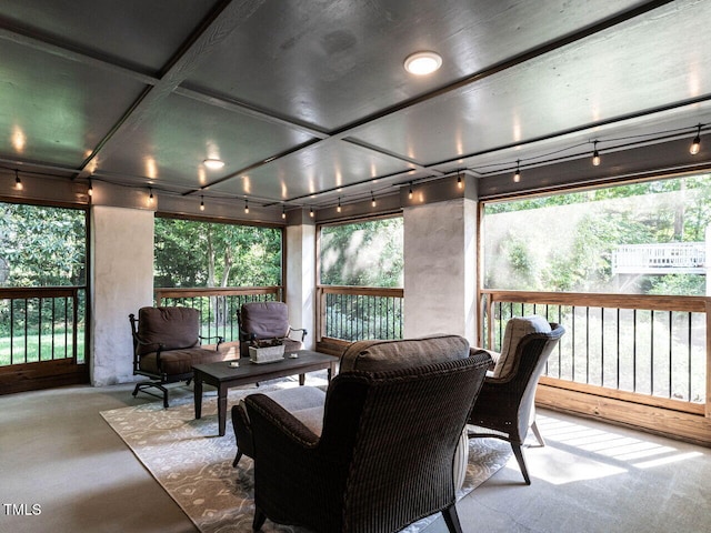 2303 Byrd St, Raleigh, NC 27608 - sunroom / solarium with finished concrete floors, coffered ceiling, and outdoor lounge area
