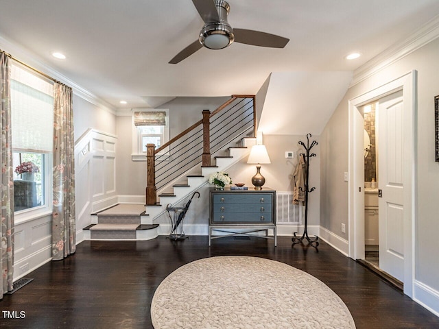 2303 Byrd St, Raleigh, NC 27608 - foyer entrance with stairway, ceiling fan, ornamental molding, wood finished floors, and recessed lighting