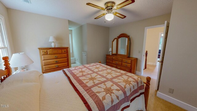 bedroom with baseboards, light colored carpet, and a ceiling fan