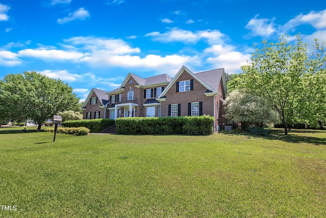 107 Stargrass Ave, Clayton, NC 27527 - view of front of property featuring a front yard and brick siding