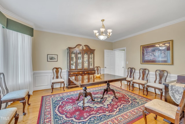 107 Stargrass Ave, Clayton, NC 27527 - office space featuring ornamental molding, a chandelier, light wood-style flooring, and a wainscoted wall