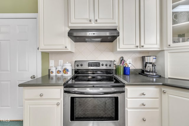 107 Stargrass Ave, Clayton, NC 27527 - kitchen featuring stainless steel range with electric cooktop, range hood, white cabinets, backsplash, and dark countertops