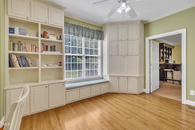 107 Stargrass Ave, Clayton, NC 27527 - living area with light wood-style floors, crown molding, and a ceiling fan
