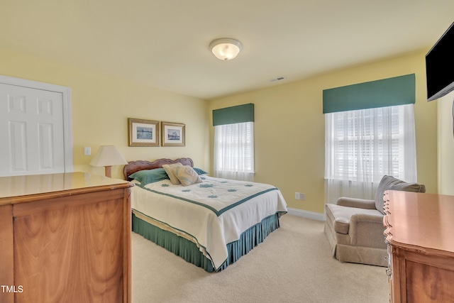 107 Stargrass Ave, Clayton, NC 27527 - bedroom featuring light carpet and baseboards
