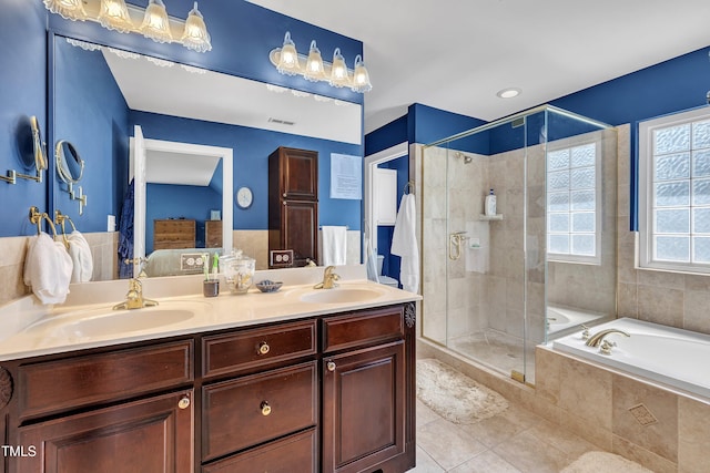 107 Stargrass Ave, Clayton, NC 27527 - full bath featuring connected bathroom, tile patterned floors, a shower stall, a bath, and double vanity