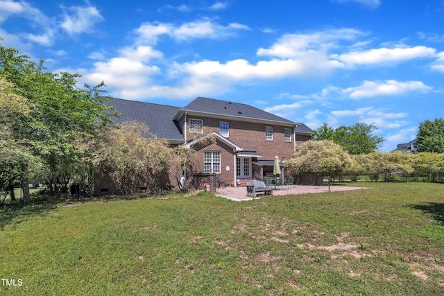 107 Stargrass Ave, Clayton, NC 27527 - rear view of property with a patio area, french doors, a lawn, and brick siding