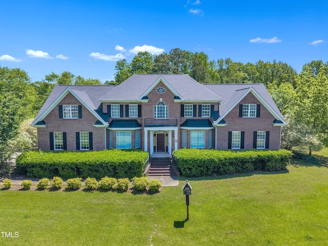 107 Stargrass Ave, Clayton, NC 27527 - colonial-style house with a front yard