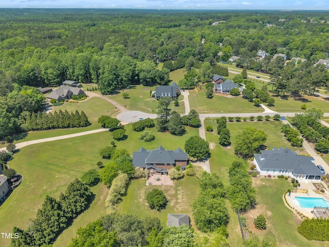 107 Stargrass Ave, Clayton, NC 27527 - drone / aerial view of a forest and a pool area