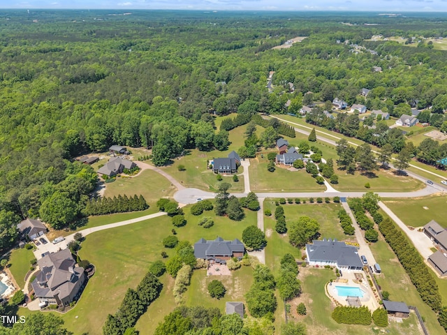 107 Stargrass Ave, Clayton, NC 27527 - aerial view of property's location with a forest, a pool area, and nearby suburban area