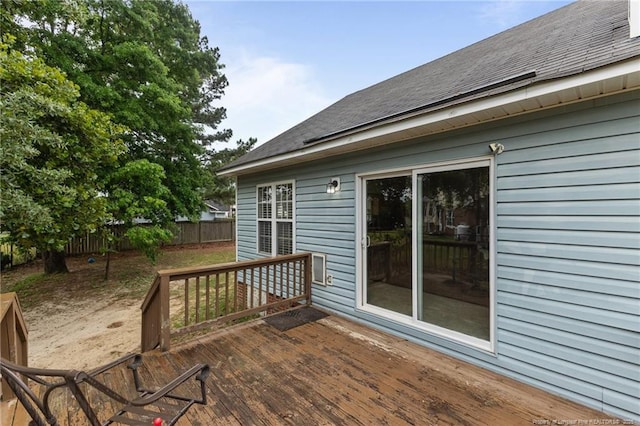 wooden deck featuring fence