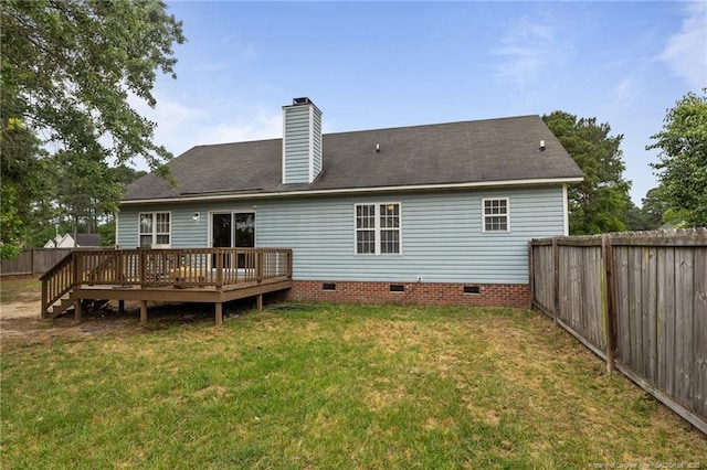 rear view of house featuring crawl space, a wooden deck, and a chimney