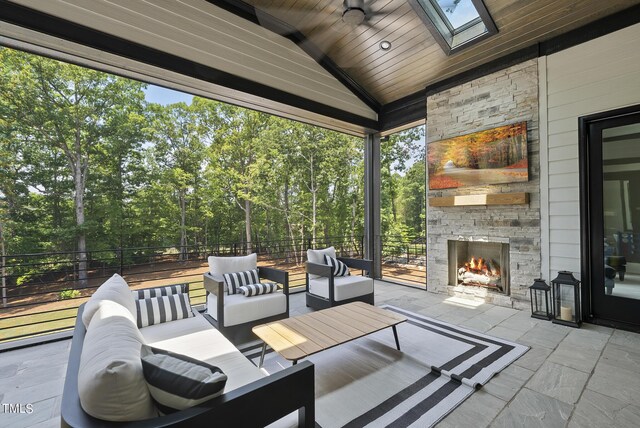 7417 Dover Hills Dr Unit 73, Wake Forest, NC 27587 - view of patio with an outdoor living space with a fireplace, fence, and a ceiling fan