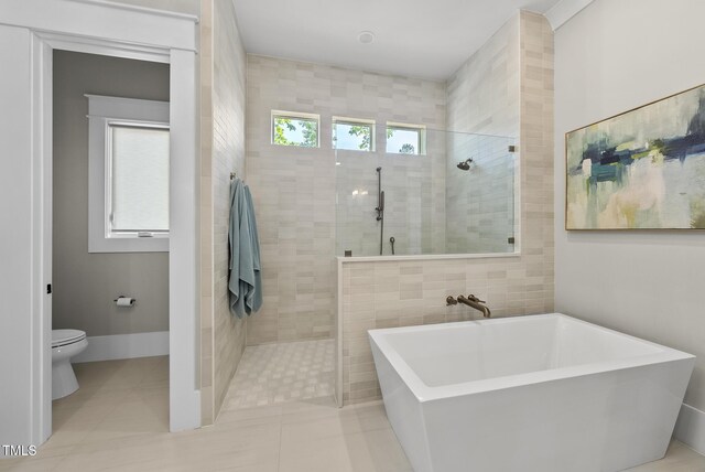 7417 Dover Hills Dr Unit 73, Wake Forest, NC 27587 - full bathroom with a walk in shower, toilet, a soaking tub, and tile patterned floors