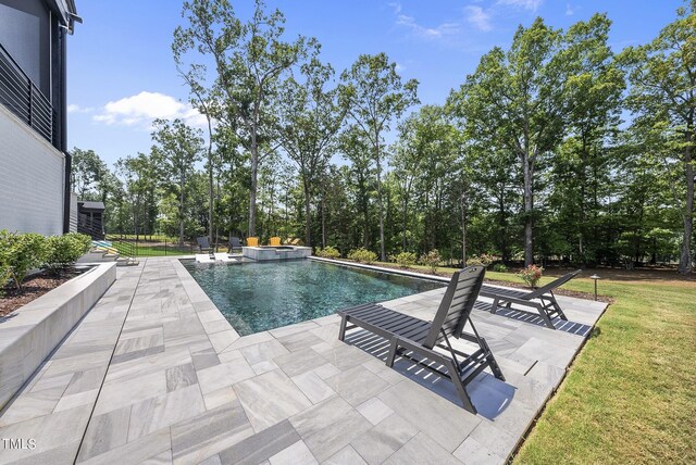 7417 Dover Hills Dr Unit 73, Wake Forest, NC 27587 - view of swimming pool with a patio area, a yard, and a pool with connected hot tub